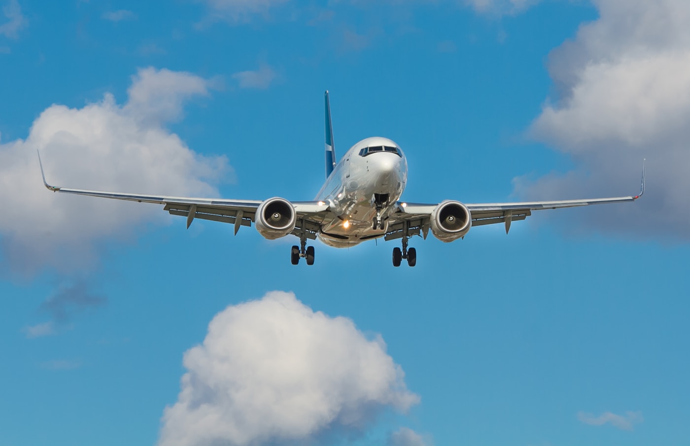 Jet aircraft on approach — scheduled air cargo
